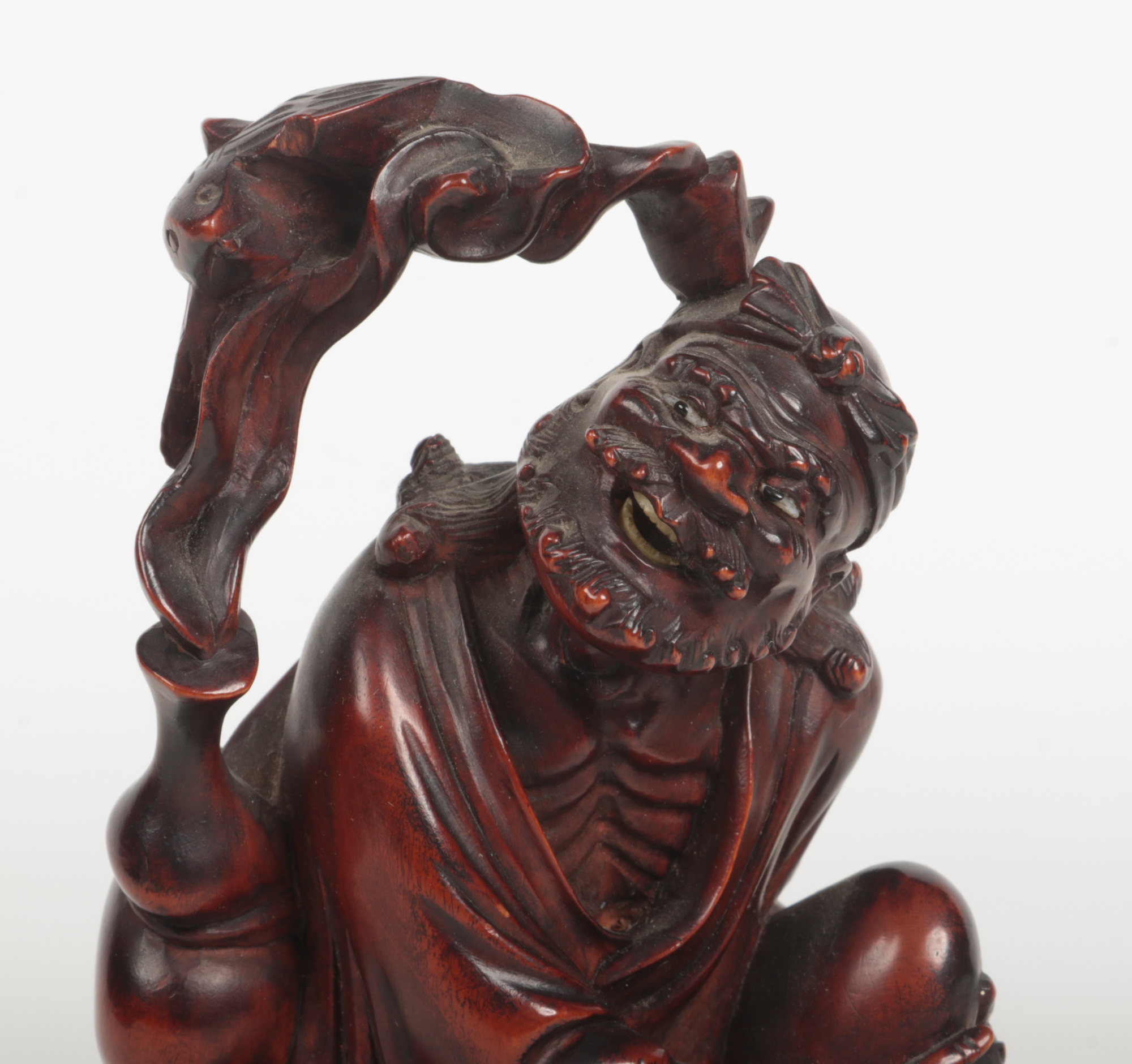 A 19th century Chinese carved wood figure of a man mounted upon a lion dog. With glass inset eyes - Image 4 of 7