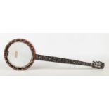 A Douglas & Co. five string rosewood banjo.