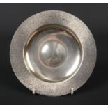 A silver dish with wide textured rim by S. J. Rose & Son. Assayed London 1971, 376 grams, 20.5cm