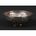 An 18th century Continental silver bowl. Decorated with repousse scrollwork and having cyrillic