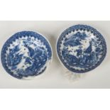 Two Caughley egg drainers. Both printed in underglaze blue with the Fisherman and Cormorant pattern.