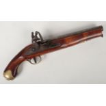 A Tower pattern flintlock pistol. With full stock, ramrod and brass furniture. Barrel length 24cm.
