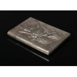 A Chinese export silver card case and cover. Decorated in relief over a textured ground with a