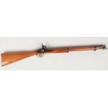 A percussion cap two band cavalry carbine. With fullstock and ramrod. Barrel length, 55cm. Action