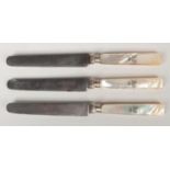Three French tea knives with mother of pearl handles. Inscribed with a Ducal coronet, Chateau de