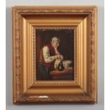 Manner of Henry John Dobson, small gilt framed oil on board. Genre interior scene with an old man