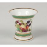 A small Rockingham trumpet shaped spill vase. Green ground, with gilt banding and painted with a