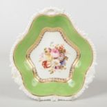 A Rockingham dessert dish with gadroon and shell moulded rim. Decorated with a wide apple green