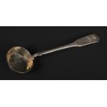 A Russian silver fiddle pattern sugar sifting spoon. With shell moulded terminal and pierced gilt