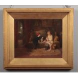 Victorian school gilt framed oil on board. Interior scene with a young boy and girl, the girl making
