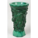 An Art Deco Bohemian pressed malachite glass goblet decorated in relief with a continuing band of