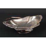 A late Victorian silver cake basket by Jenkins & Timm. With swing handle and gadrooned rim cast with