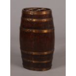 An early 20th century coopered oak barrel formed stickstand. Label for Lethbridge's Cooperage,