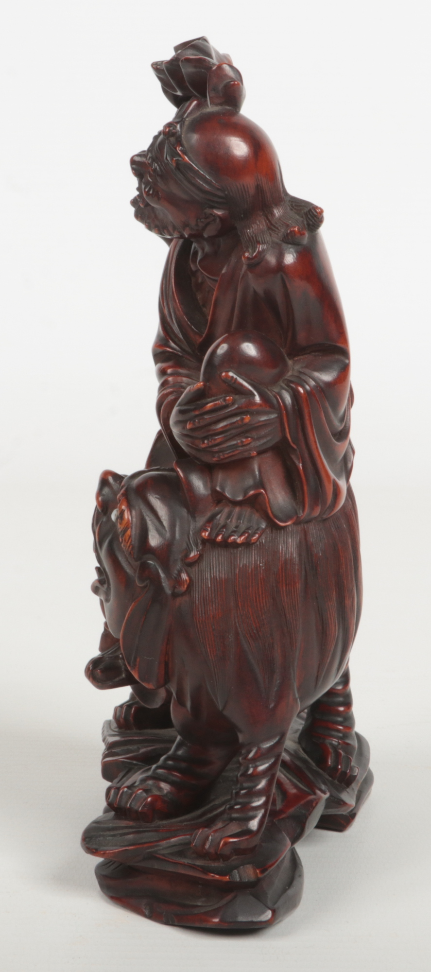 A 19th century Chinese carved wood figure of a man mounted upon a lion dog. With glass inset eyes - Image 6 of 7