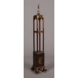 A George V mahogany Chinoiserie pagoda two tier standard lamp. With open fret carving and raised