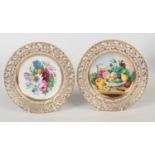 A pair of early 19th century German Giesshubel porcelain cabinet plates. With pierced borders
