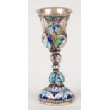 A small Russian silver goblet with enamelled decoration. With knopped stem and raised on a domed