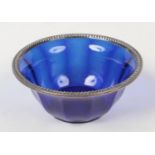 A French faceted blue glass bowl with silver rim. Monogram to the glass, 13.25cm diameter. Good