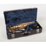 A Yamaha brass alto saxophone in hard case. Stamped Yamaha YAS-62 021248. Very good condition.