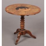 A 19th century Sorrento ware centre pedestal olive wood occasional table. With a marquetry panel