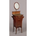 An Edwardian mahogany gentleman's shaving stand. With satinwood banding, bottle green tiled top