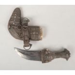 A silver mounted Janbiya dagger in scabbard, 19cm. Blade loose from the grip.