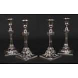 A fine set of four George III silver table candlesticks by John Cafe in later fitted case.