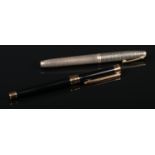 A Sheaffer sterling silver fountain pen with 585 14 carat gold nib and another fountain pen.