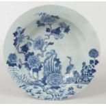 An 18th century Chinese blue and white pan topped bowl. Painted in underglaze blue with a crane in a
