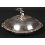 A 19th century silver plated entree dish and cover. Circular form, with stag head finial, with