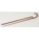 A chestnut sword stick / rummage stick with square blade stamped Mole, Birmingham. Blade length