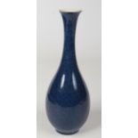 A Sevres powder blue ground bottle vase of pear form. Printed mark, 24.5cm. Neck ground, foot