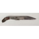A 19th century Ceylon dagger, silver mounted and with carved horn scales, 28cm. Pitting to the