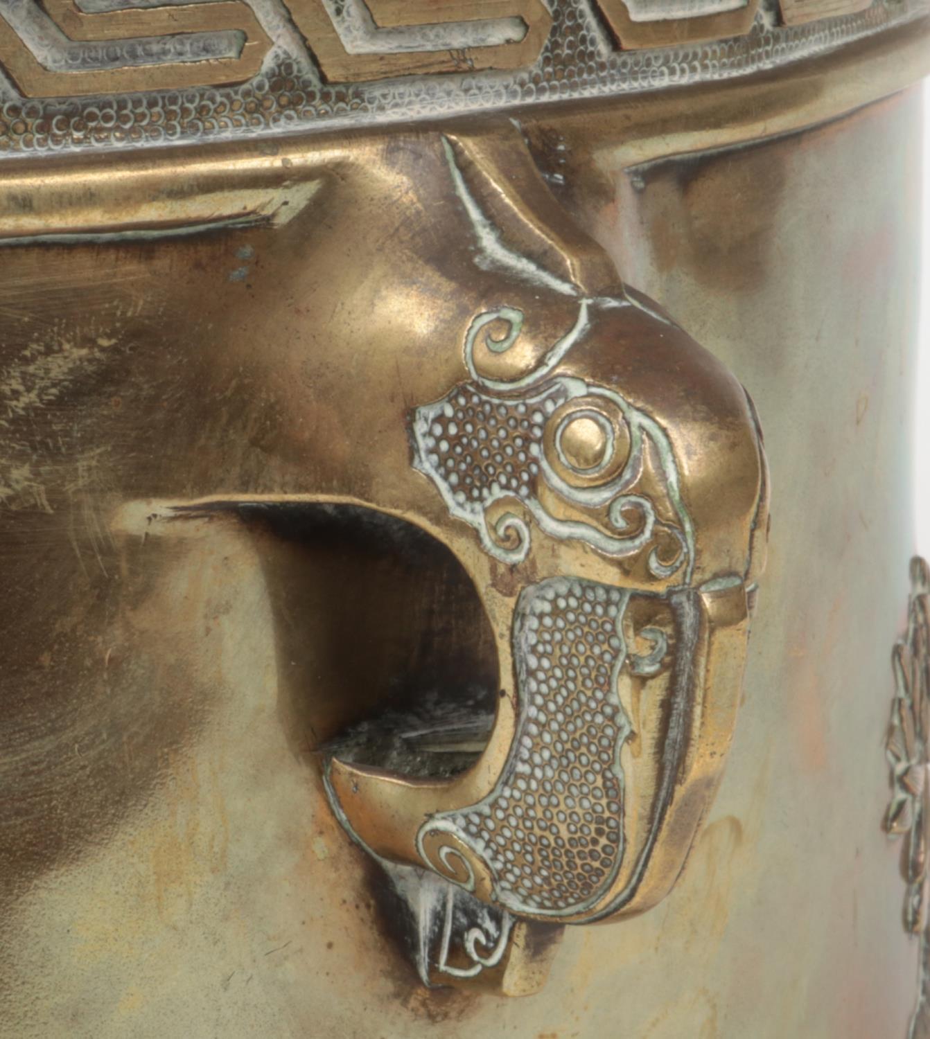 A Japanese Meiji period bronze planter. With twin elephant mask handles and decorated in relief with - Image 3 of 3