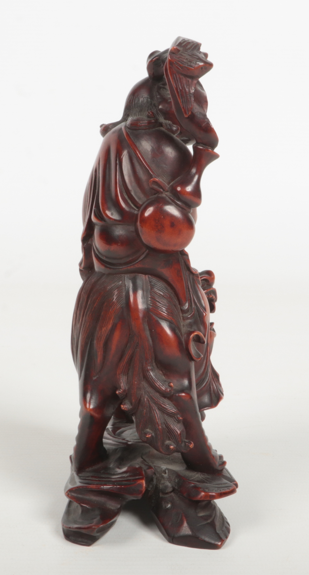 A 19th century Chinese carved wood figure of a man mounted upon a lion dog. With glass inset eyes - Image 3 of 7