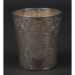 A George III silver Christening beaker. Chased with grounds of fruit and flowers and with