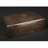An Edwardian silver cigar box with planished ground and lined interior by Jane Brownett. Assayed