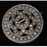 A Scottish white metal roundel plaid brooch, 6cm diameter. Good condition.