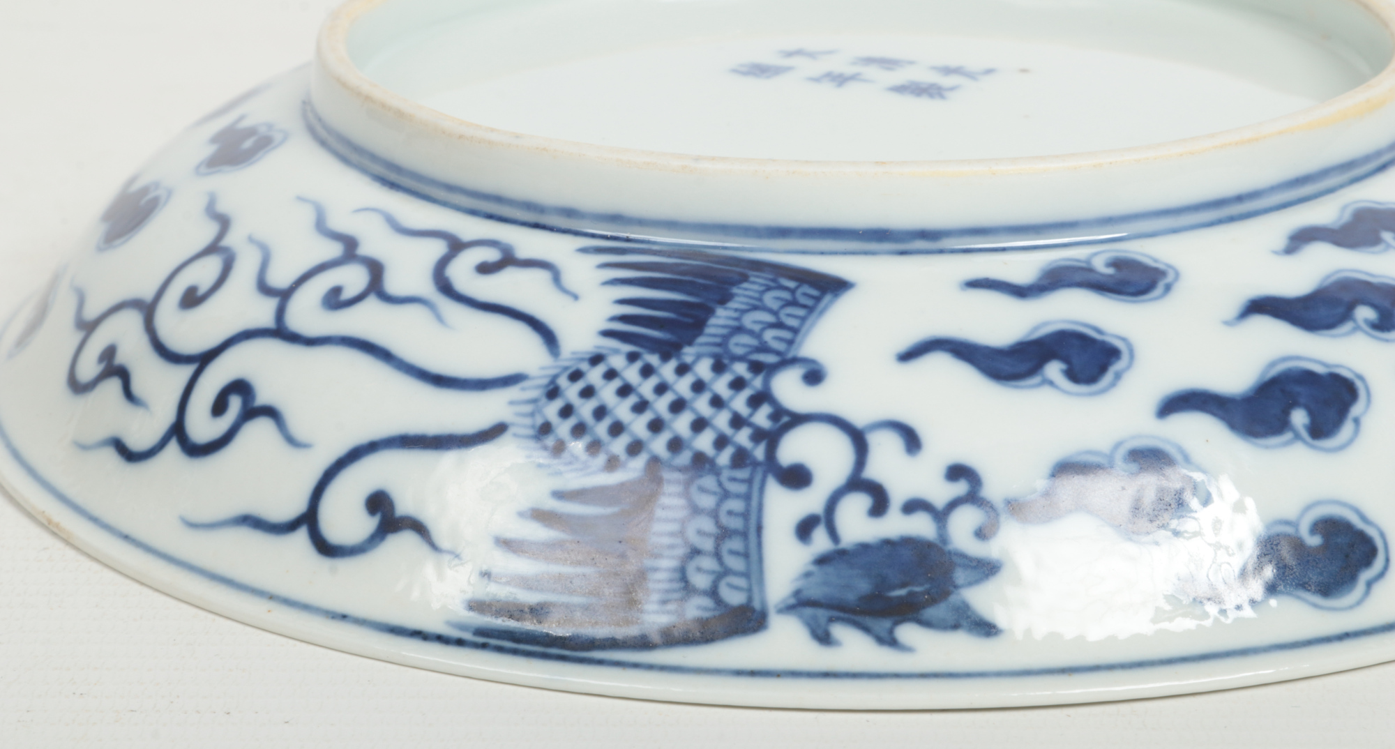 A Chinese Kangxi (1662-1722) blue and white Phoenix dish. Painted in underglaze blue with a pair - Image 7 of 9