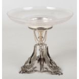 An early 20th century silver plated and cut glass centrepiece / comport. Raised on a triform base