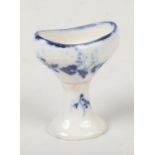 A rare Caughley eye bath of pedestal form. Painted in underglaze blue with trailing sprigs c.1780,