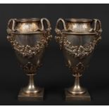 A pair of 19th century German silver pedestal Neo-Classical vases by Johann Siegmund Kurz & Co. Each