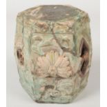 A Chinese Ming dynasty glazed terracotta miniature barrel stool. Of hexagonal form, pierced and with