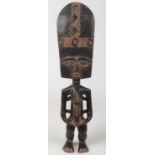 A West African tribal carved hardwood statue of a mother and child, 49.5cm. Good condition.