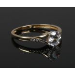 A 9ct gold dress ring set with brilliant cut cubic zirconia stone. Size O.