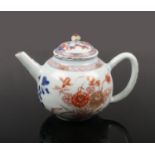 An 18th century Chinese export Imari teapot and cover of small proportions. Painted with