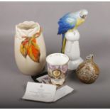 A small group of ceramics, to include Kathausen parrot, Clarice Cliff vase etc. Parrot with damage