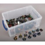 A box of heroclix game pieces,