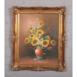C Benott, A gilt frame oil on board, floral still life. (49cm x 39cm).