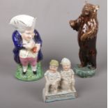 A German Fairing group ' Let us do Business together' figures, to include Staffordshire Toby jug and